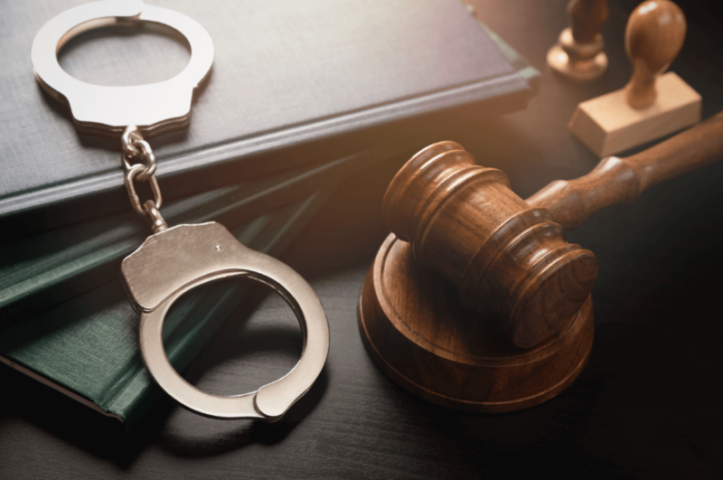 A gavel and handcuffs representing criminal defense law
